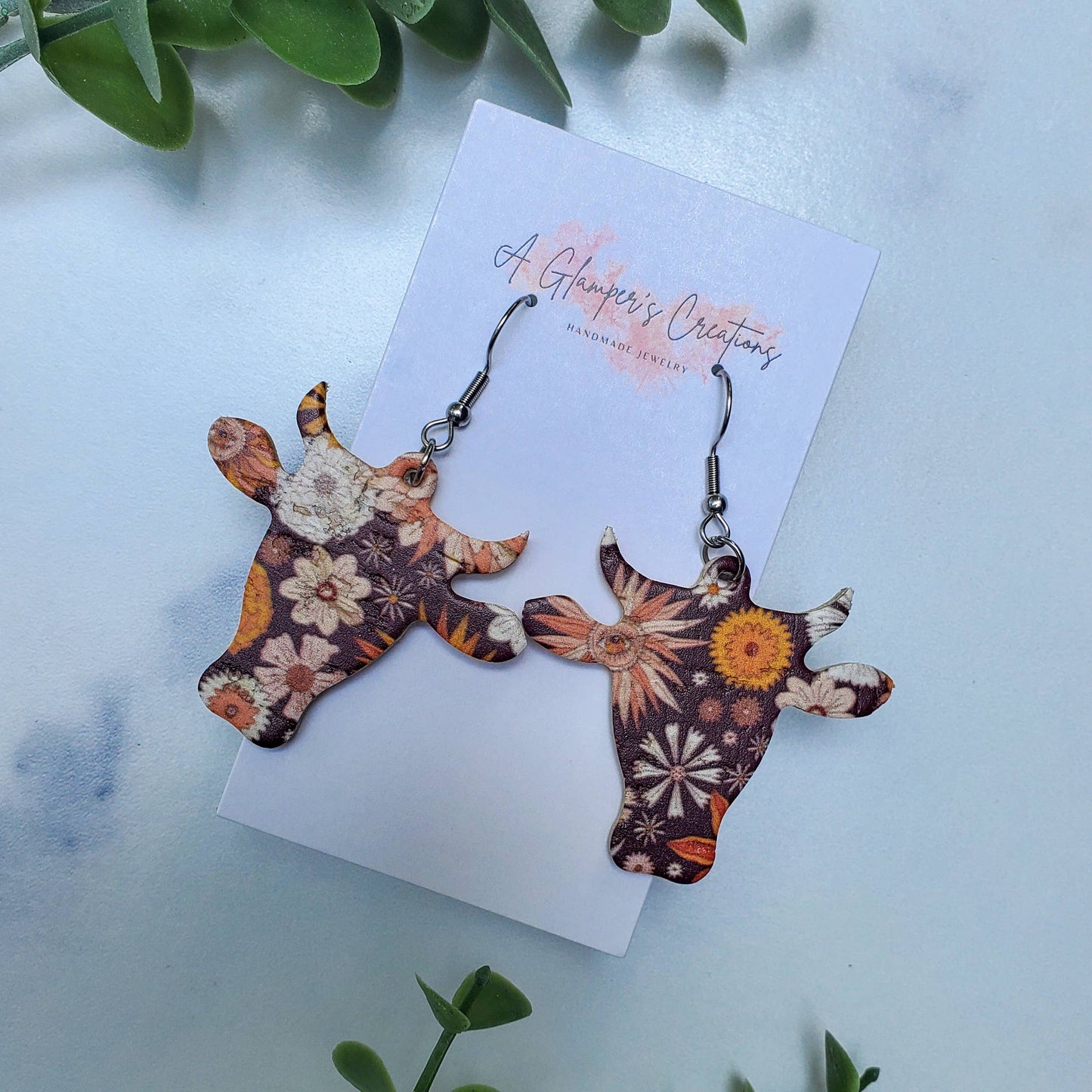 A Glamper's Creations LLC - Retro Floral Cow Western Leather Earrings